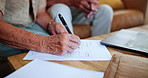 Elderly man, pen and paper with writing on sofa for loan application, mortgage or healthcare debt. Senior person, retirement and documents for life insurance, information and personal details