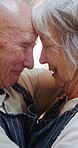 Elderly, couple and hug in kitchen with love, support and care in marriage and retirement. Senior, man and woman embrace with kindness or gratitude for cooking dinner in home together with happiness