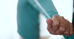 Hand, physiotherapy and stretching band for healthcare, wellness or rehabilitation in home. Resistance, person and help for recovery, training or physical therapy to exercise muscle on arms closeup