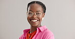 Black woman, glasses and portrait with smile in studio with fashion for vision, sight or eye care on grey background. Spectacles, confident and face of person with happiness, style and trendy clothes