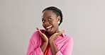 Black woman, studio and portrait with smile with happiness for thank you, compliment or confident on grey background. African person, face and expression with satisfaction for joy, pride and surprise