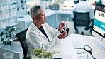 Science, woman and test tube with plant in laboratory for sample inspection, growth progress and gmo engineering. Biotechnology, senior scientist and pharmaceutical analysis for sustainable medicine