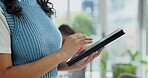 Tablet, hands and business person research, scroll or reading email on internet in startup office. Technology, professional and closeup of creative designer on website for communication or network