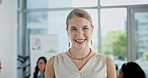Face, happy and business woman in office, workplace or startup company for career. Portrait, professional entrepreneur and smile of creative designer, person and employee laughing in Switzerland