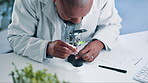 Science, study and black man with plants, magnifying glass for research and safety in medical engineering. Biotech, botany and leaves, scientist or lab technician in checking growth in laboratory.