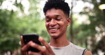 Phone, laughing and fitness man in a park with social media, chat or location search in nature. Smartphone, app and male runner in a forest with online comic, joke or meme, text and gif communication