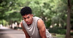 Sweat, exhausted and portrait of athlete with break in nature for sport, exercise and training for competition. Man, breathe and tired from workout for fitness, run fatigue and cardio in park