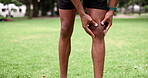 Man, athlete and knee pain on sport field for body workout with hands and anatomy outside. Exercise, wellness and black person with leg injury in emergency with inflammation and painful muscle 