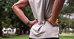 Runner, park and back with massage, pain and cardio for exercise and health. African man, training and risk with injury, muscle and anatomy for competition performance with fatigue or wellness