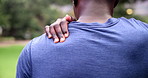 Park, shoulder pain and man with fitness, injury and workout with fibromyalgia or muscle tension. African person, athlete or runner with emergency or health crisis with inflammation, broken or bruise