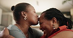 Sofa, kiss and senior mother hug woman for loving relationship, bonding and relax together. Family, home and African mom with daughter kissing forehead for love, care and embrace in living room