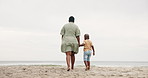 Mom, child and holding hands on beach sand for support, bonding and walking outdoor on holiday. Back of parent, mother or family with kid by ocean, sea or water in nature for love and care on mockup