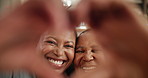 Love, mother and daughter with heart in selfie for social media, profile picture or happy memory. Kiss, mom and girl in portrait together at home with care, support and kindness in black family