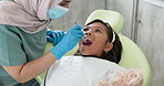 Dentist, woman and child mouth for check, assessment and teeth cleaning service, medical and dental support. Orthodontist or doctor with kid or girl from Indonesia for tooth consultation and care