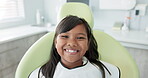 Dentist, smile and face of child for teeth, orthodontics and wellness in medical health. Dental care, happy and portrait of female patient for healthcare, oral hygiene and confidence at clinic.