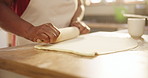 Closeup, hands and dough for cooking in kitchen with rolling pin, wheat or meal prep for pizza or bread in home. Person, baking process or ingredients with pastry for cake, handmade cookies and snack