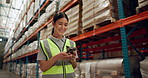 Happy woman, logistics and typing with phone for communication, social media or networking at warehouse. Young female person or employee with smile on mobile smartphone for online chatting or texting