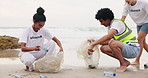 Happy people, volunteer and cleaning beach with recycling plastic, bottles and bags for community service. Group of volunteering workers collecting rubbish, dirt or garbage to save the earth or ocean