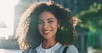 Business woman, face and smile in city with travel, sunshine and commute to work at architecture company. Happy outdoor, portrait and lens flare, architect in urban street with pride in career