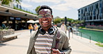 Face, tourist or headphones for relax, walking and sightseeing on backpacking holiday in Brazil. Happy, gen z and black man for wireless, audio and entertainment for break or walk on vacation