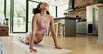 Stretching, woman or yoga in living room for fitness or balance or exercise for mindfulness, zen and healthy body. Person, workout or training on mat for wellness, breathing or relax in home on floor