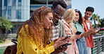 Group, students and smartphone for texting at college, mobile app and share with post, meme or web blog. Friends, men and women with phone for social media at university with connectivity in Atlanta
