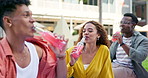 Friends, group and drink cheers at picnic or holiday bonding with beverage for connection, weekend or outdoor. Men, woman and diversity or alcohol at park in America or relaxing, vacation or together