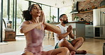 Couple, people and meditation on yoga mat for exercise, fitness and wellness in house, home and living room. Man, woman and gym partners together in lotus position for workout, training or relaxation