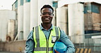 Man, face and engineering with hard hat at construction site or contractor project, architecture or quality control. Black person, portrait and smile or helmet for development, management or building