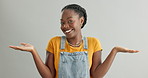 Choice, offer or face of black woman confused by mockup option or comparison on grey background. Asking question why, shrug or open hands of an uncertain African female person with decision in studio