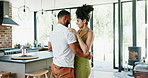 Man, woman and happy for dancing in kitchen with bonding, connection and love with laughing in house. Dancer couple, steps and moving together with rhythm, smile and embrace apartment in Colombia