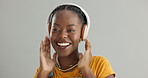 Happy, dance or black woman listening to music, podcast and radio audio on subscription in studio. Jazz, headphones and African person streaming a song isolated on a white background for wellness