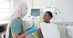 Happy woman, dentist and patient with consultation for dental care, teeth cleaning or treatment at clinic. Young female person or orthodontist consulting customer for oral, gum or tooth whitening