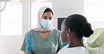 Muslim woman, dentist and patient with consultation for dental care, teeth cleaning or treatment at clinic. Young female person or orthodontist consulting customer for oral, gum or tooth whitening