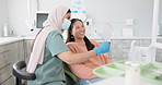 Happy woman, dentist and patient with mirror for treatment, dental care or teeth cleaning at clinic. Young female person, orthodontist and customer with big smile for oral, gum or tooth whitening