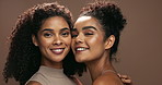Women, face and together for cosmetics in studio with smile, solidarity and glow on skin by brown background. Girl friends, people or model with skincare, health and facial beauty with natural makeup