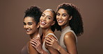 Face, women and group with skincare, beauty and laughing on a brown studio background. Models, friends and girls with wellness and wellness with luxury and inclusion with healthy skin and dermatology
