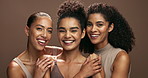 Face, women and smile together in studio, beauty and skincare with diversity for support and wellness. Natural makeup, cosmetology and dermatology or cosmetics for self care, glow and aesthetic skin.