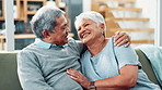 Senior couple, hug and laughing on sofa with conversation for funny memory with love, care and bonding. Old man, elderly woman and happy with embrace, connection and remember with comic chat in home