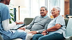 Senior couple, nurse and consultation with tablet on sofa at home for healthcare, advice or retirement plan. Elderly man and woman listening to medical caregiver on technology for counseling at house