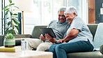 Tablet, couch and senior couple with online, social media and game with bonding and care. Retirement, home and streaming on a website or internet in a living room with tech and watching a video