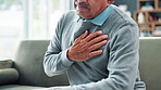 Elderly man, hand and chest pain or heart attack at home with healthcare risk or injury, lungs or problem. Senior person, asthma and retirement in apartment or illness discomfort, medical or crisis