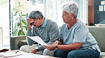 Senior couple, paperwork and stress for home debt, finance or budget with depression, pain or headache. Elderly woman and sad man with documents for loan, inflation or bankruptcy letter and confused
