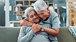 Senior couple, hug and love on couch for marriage, support or happy life together at home. Excited elderly man and woman with embrace, bonding and romance in living room for health, care and wellness
