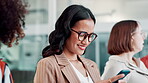 Face, phone and smile with business woman in office for hiring, interview or onboarding recruitment. App, email and social media with happy young employee typing text message on mobile in workplace