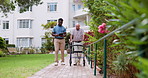 Caregiver, senior man and walking frame in garden, tablet and talking for recovery at clinic. African medic, doctor and person with disability on path for care, chat or touchscreen for rehabilitation