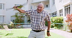 Elderly, man and walking stick or dancing in park for fun in retirement for comedy happiness, weekend or garden. Old person with a disability, cane and goofy senior or carefree positive, joy or grass