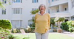 Senior woman, smile and dancing outdoors, retirement and celebrate a milestone on grass. Elderly female person, portrait and moving on lawn of nursing home, having fun and confidence on weekend