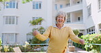 Senior woman, happy and dancing outdoors, retirement and celebrate a milestone on grass. Elderly female person, portrait and spinning on lawn of nursing home, having fun and confidence on weekend