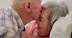 Forehead, kiss or old couple in bed to relax for connection, support, bonding for trust together. Home, elderly or romantic people in marriage, house or retirement with commitment, care or affection
